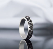 Load image into Gallery viewer, Triquetra Symbol Ring with Red Cubic Zirconia Sterling Silver Celtic Ring